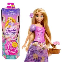 Muñeca princesa disney rapunzel spin and reveal. incluye 5 accesorios y 5 pegatinas.