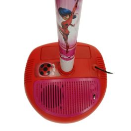 Microfono de pie con amplificador y guitarra lady bug Microfono de pie con amplificador y guitarra lady bug