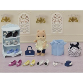 Sylvanian Families Moda y maleta de perro caramelo de hermana mayor para niños a partir de 3 años