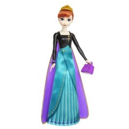 Muñeca frozen anna spin and reveal.incluye 11 sorpresas 5 accesorios y 5 pegatinas con una escena de juego inspirada en la pelicula.