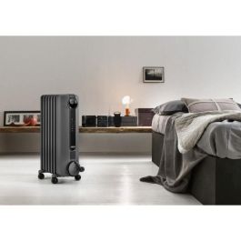 Radiador en baño de aceite RADIA DELONGHI - 1500W - 3 etapas de calentamiento - Tecnología Real Energy - Pantalla digital - Batería Radiador en baño de aceite RADIA DELONGHI - 1500W - 3 etapas de calentamiento - Tecnología Real Energy - Pantalla digital - Batería