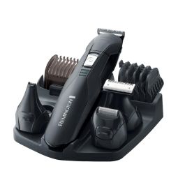Remington Afeitadora eléctrica recargable pg6030 con cuchillas de acero inoxidable, 2 peines y 4 cabezales