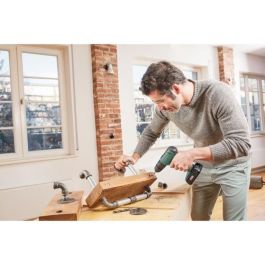 Bosch BOS4053423225150 Taladro Atornillador UniversalImpact 18V con 1 batería de 1,5 Ah y cargador AL 1810 CV