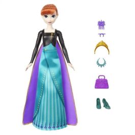 Muñeca frozen anna spin and reveal.incluye 11 sorpresas 5 accesorios y 5 pegatinas con una escena de juego inspirada en la pelicula.