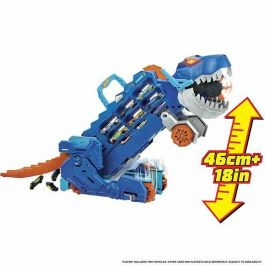 Camión hot wheels city t-rex definitivo. dinosaurio transporte y pista para coches de juguete. incluye 2 vehiculos.