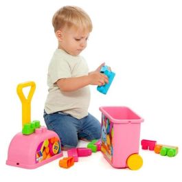 Carrito maleta trolley rosa con 20 bloques. Carrito maleta trolley rosa con 20 bloques.