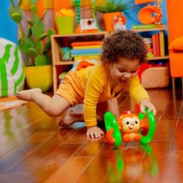 Bright Starts Little Roll & Glow Monkey - Juguete interacivo para bebés - Mono rodante que se ilumina